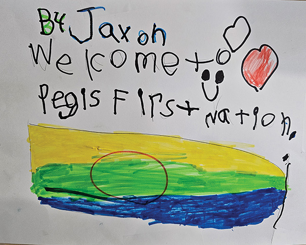 Welcome sign by a student.